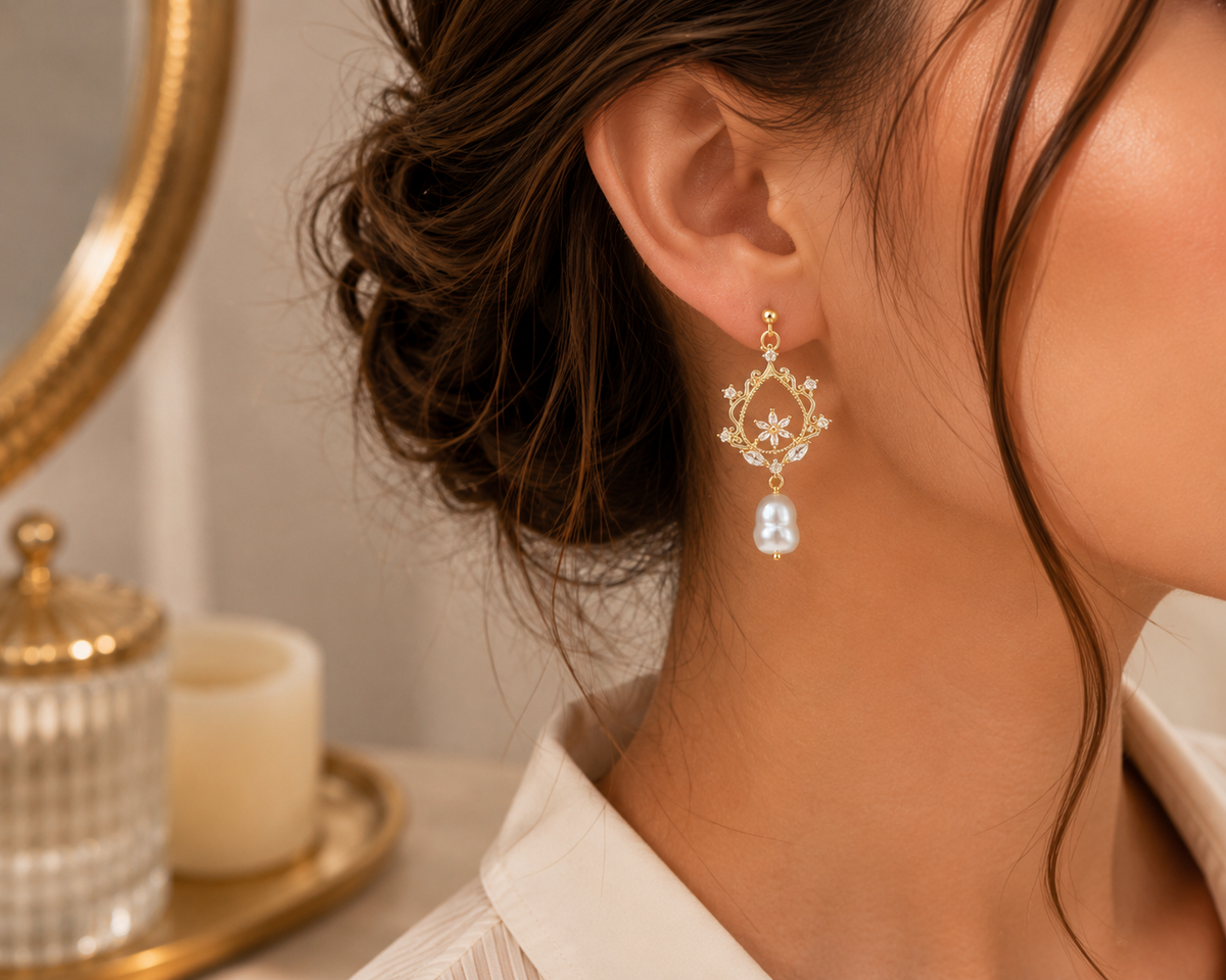 Side view of woman wearing freshwater pearl floral drop earrings