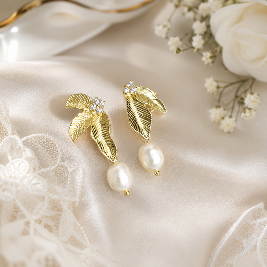 Gold leaf dangle earrings with white freshwater pearls and crystal accents