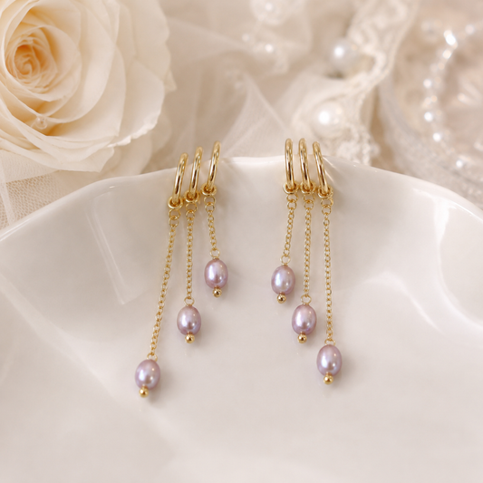 Pair of gold-tone triple chain earrings with lavender freshwater pearl drops