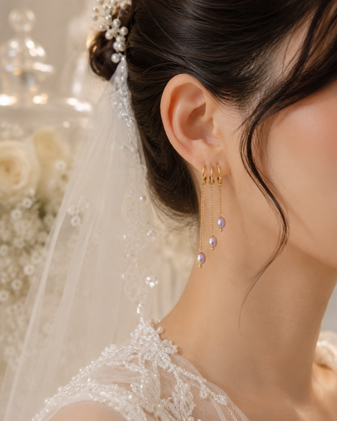 Side view of a bride wearing lavender freshwater pearl chain drop earrings