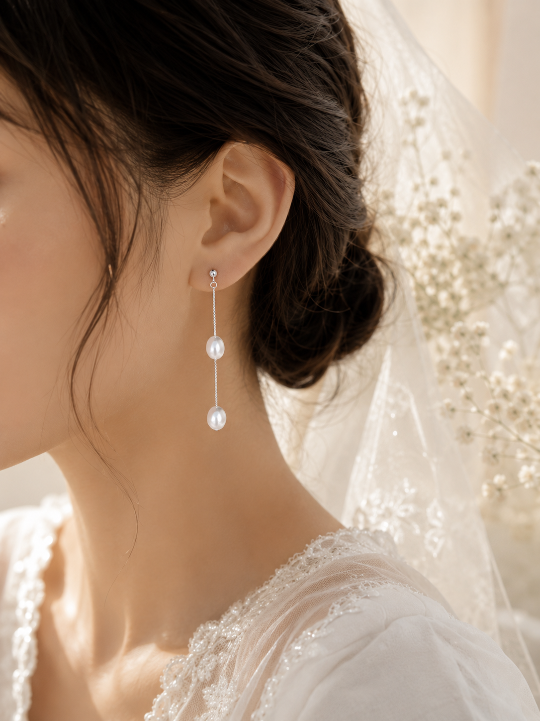 S925 sterling silver chain earrings with white freshwater pearls styled for a bridal look