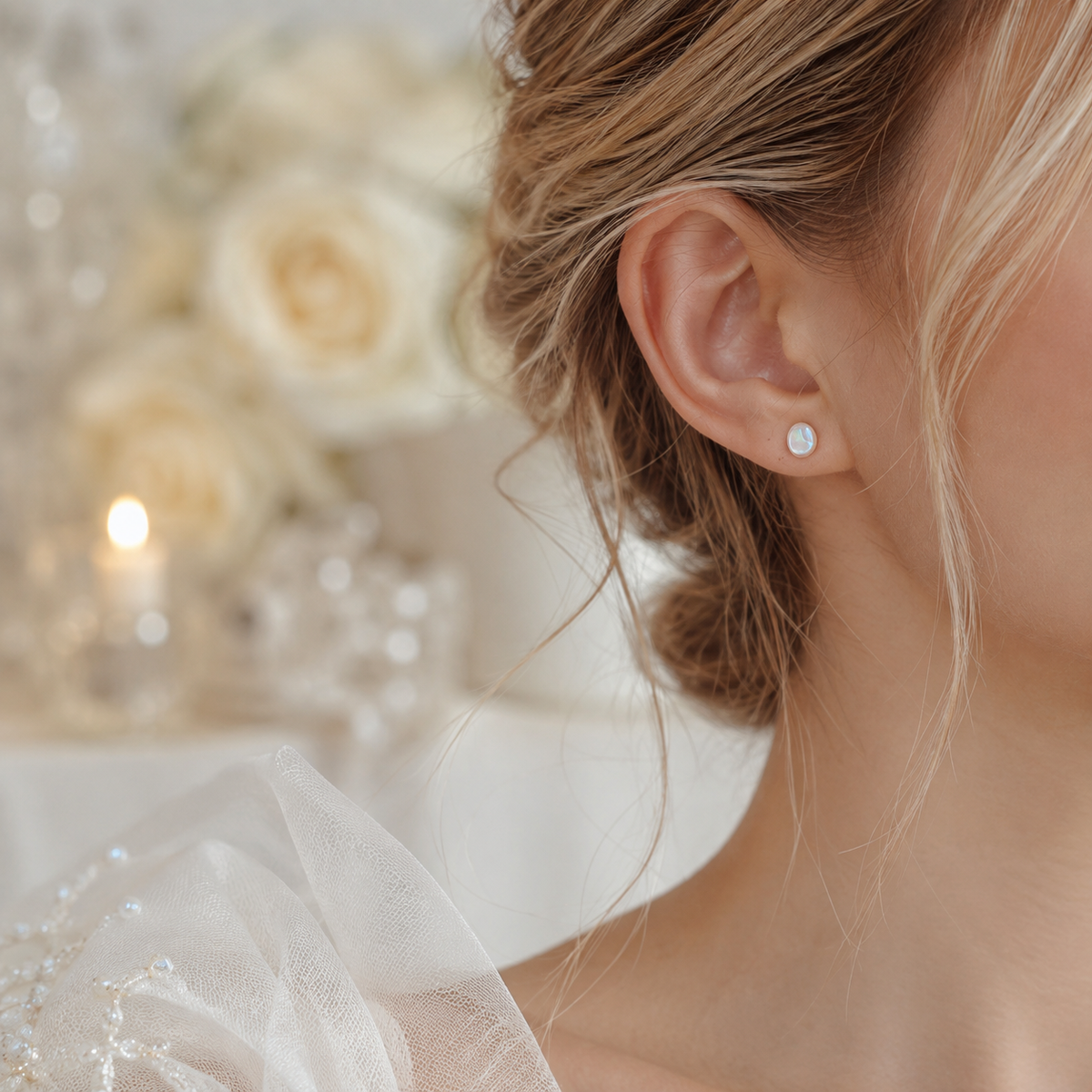 Bride wearing a minimalist white baroque freshwater pearl stud earring