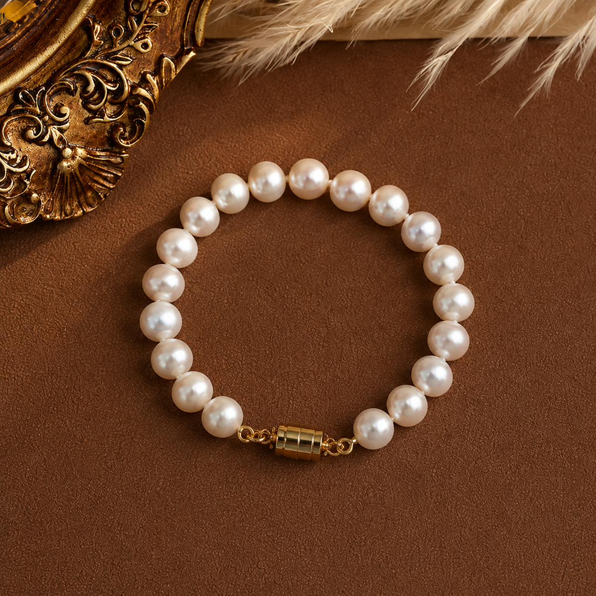 White freshwater pearl magnetic bracelet displayed on a warm brown surface